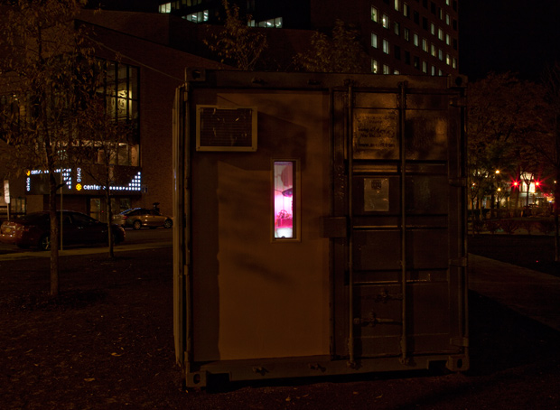 Shipping container installation nighttime close-up